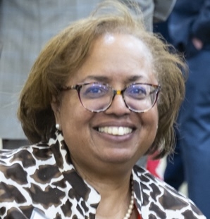 woman in glasses smiling